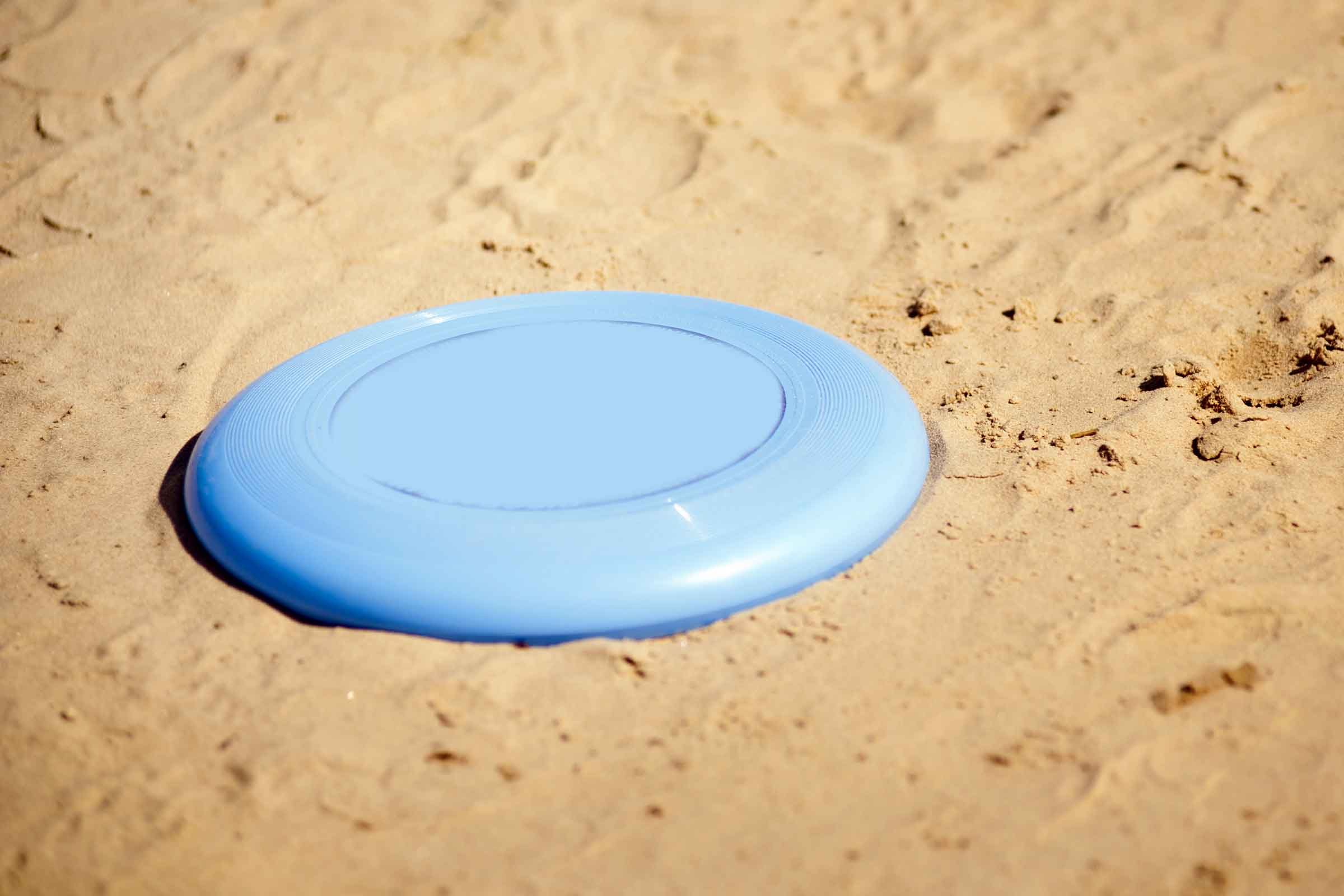 frisbee in sand
