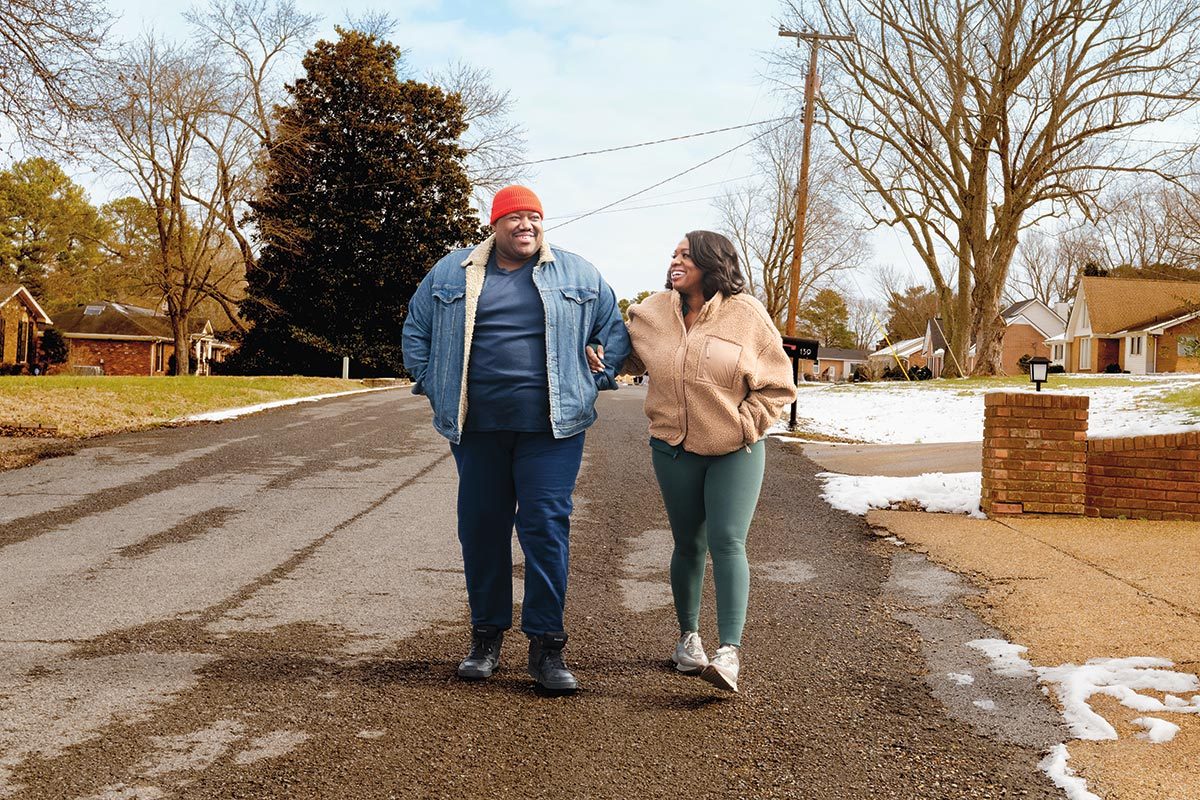 The War And Treaty's Michael And Tanya walking on a street